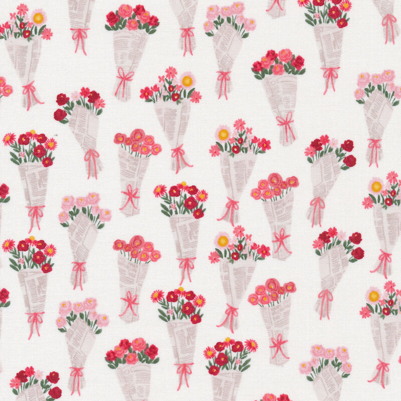 fabric featuring adorable bouquets of pink and red flowers wrapped in newspaper on a white background