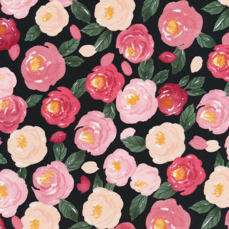 fabric featuring pink and cream watercolor roses with dark green leaves on a solid black background