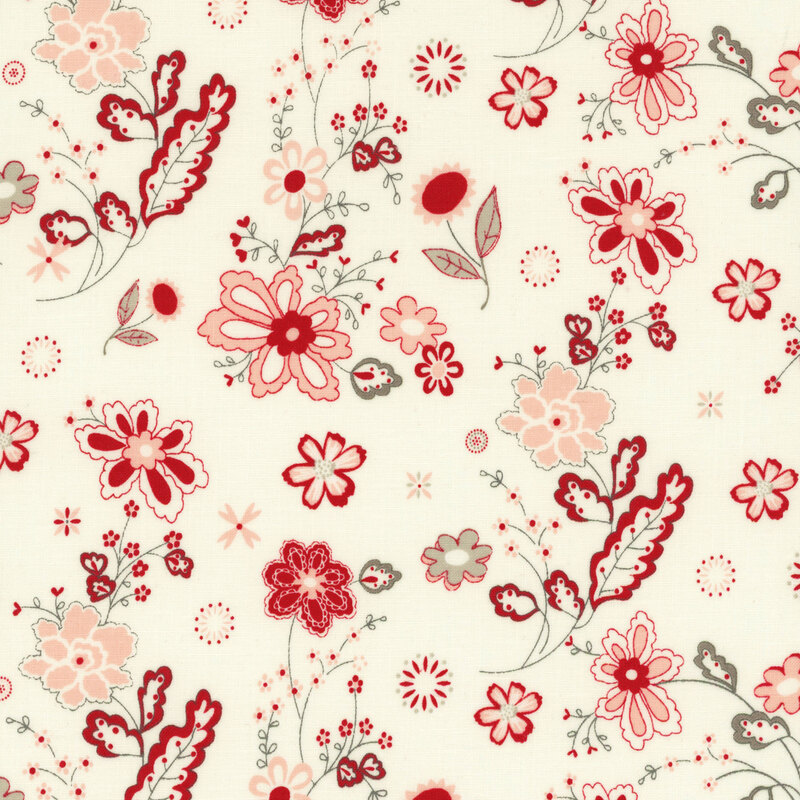 fabric featuring red, gray and white florals and vines in a paisley style on a solid cream background