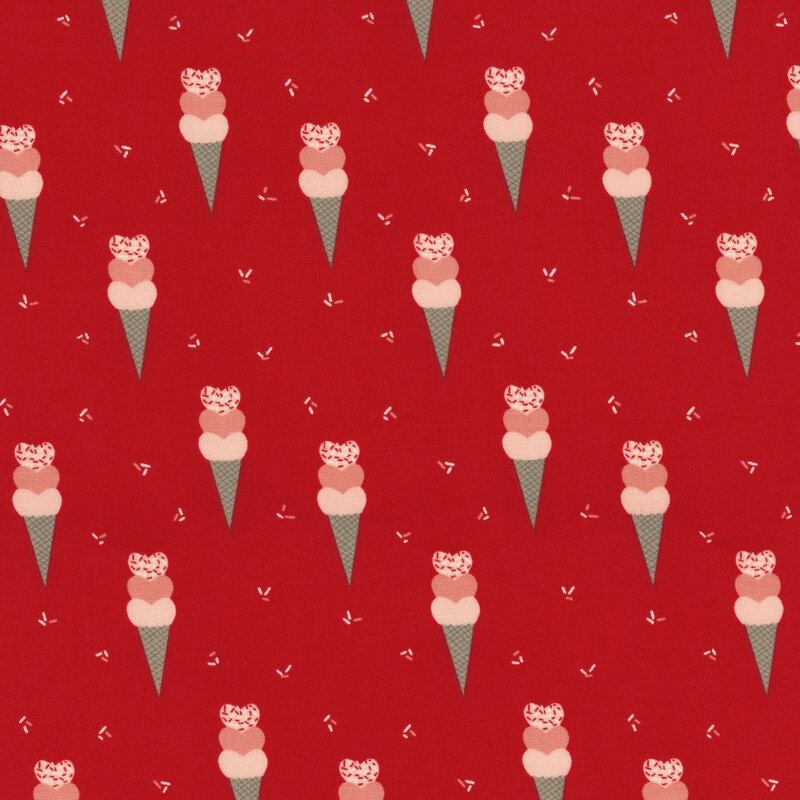 fabric that features ice cream cones with hearts on a solid red background