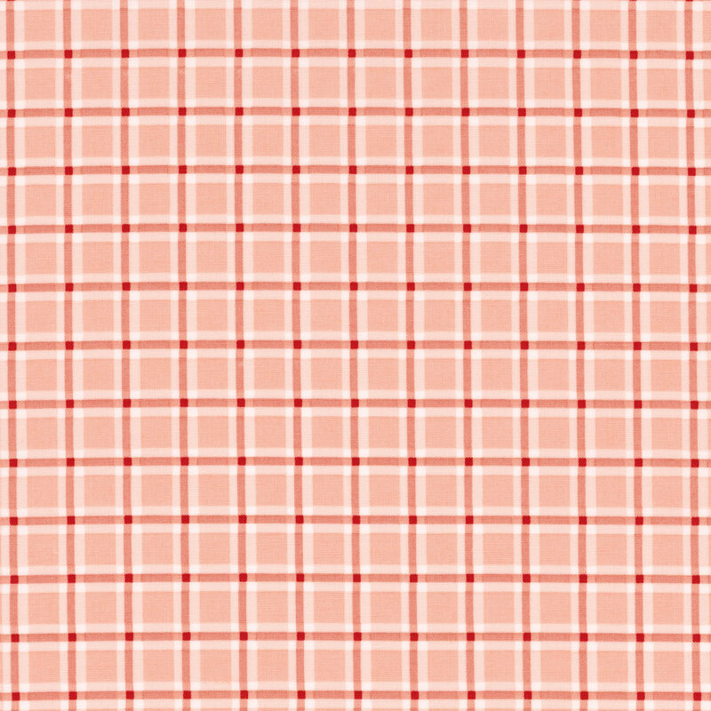 fabric featuring a blush pink, red, and cream plaid pattern