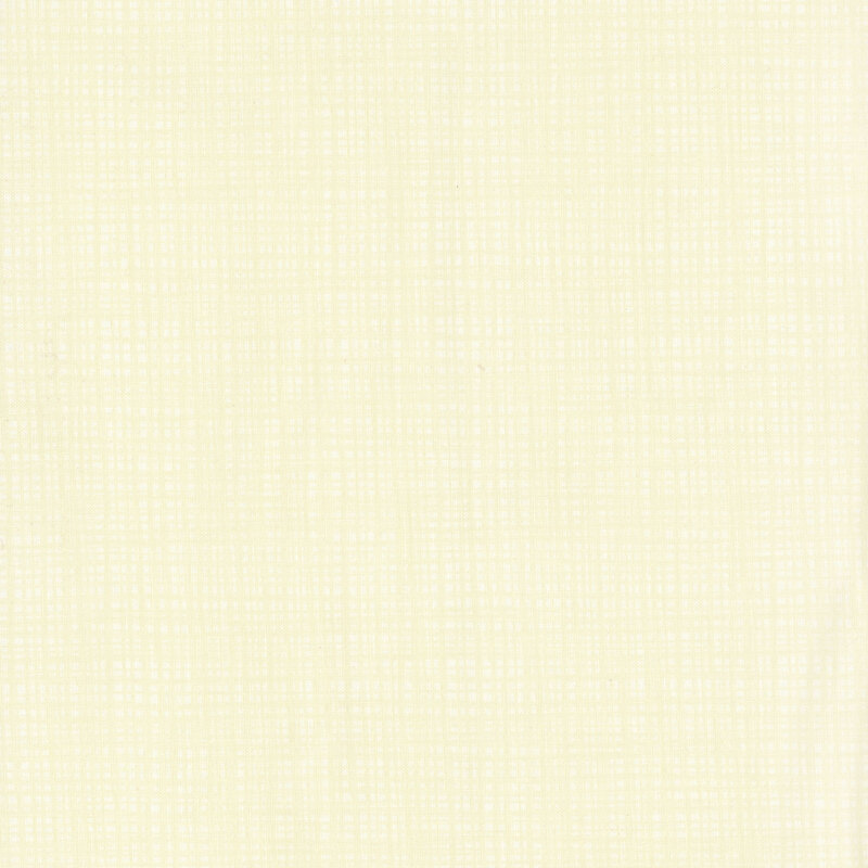 A tonal cream fabric with a textured background