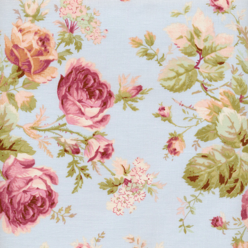 Image of fabric featuring large pink roses, leaves, and tiny beige wildflowers on a light blue background