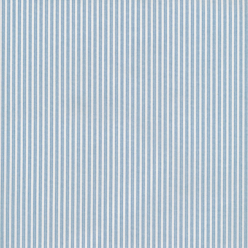 Image of fabric featuring blue stripes on a cream background