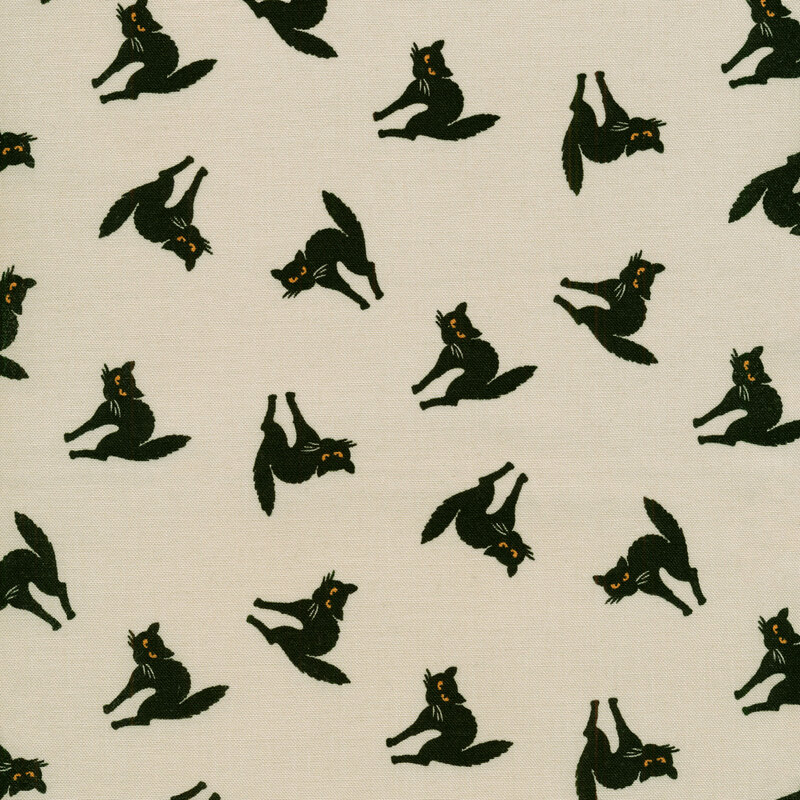 Light beige fabric with black cats scattered across it