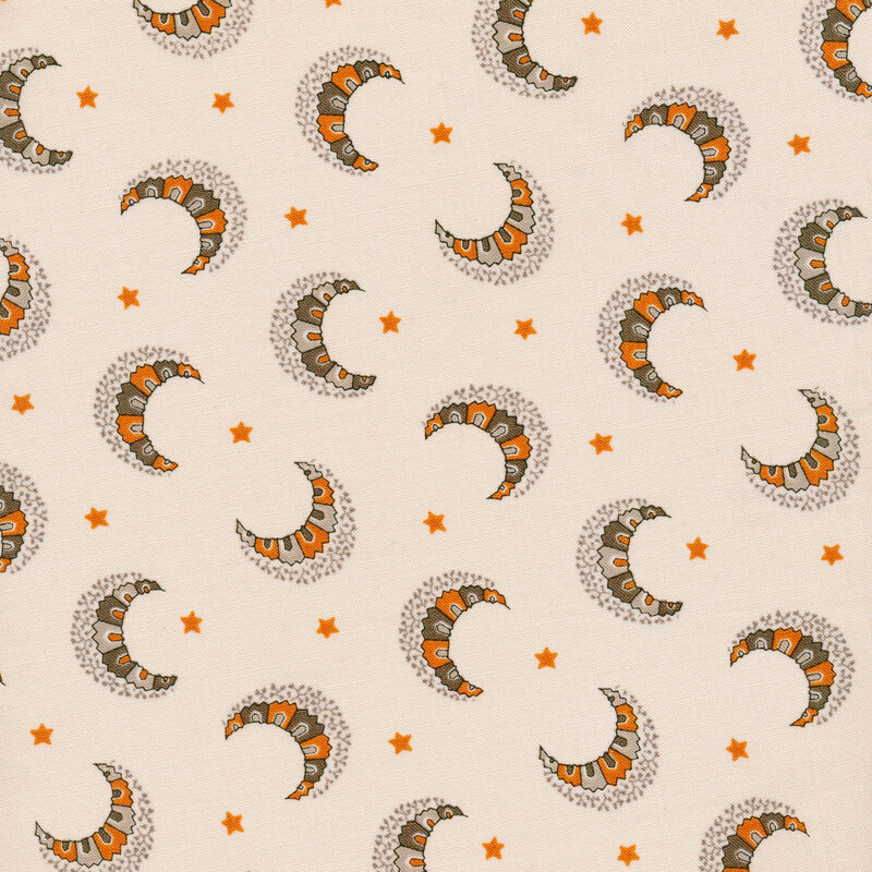 cream fabric with mosaic-like crescent moons in orange and grey scattered across it with small stars in between
