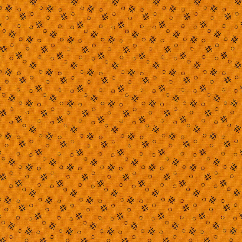bright orange fabric with modern geometric patterning that consists of black crosshatches and dotted circles.