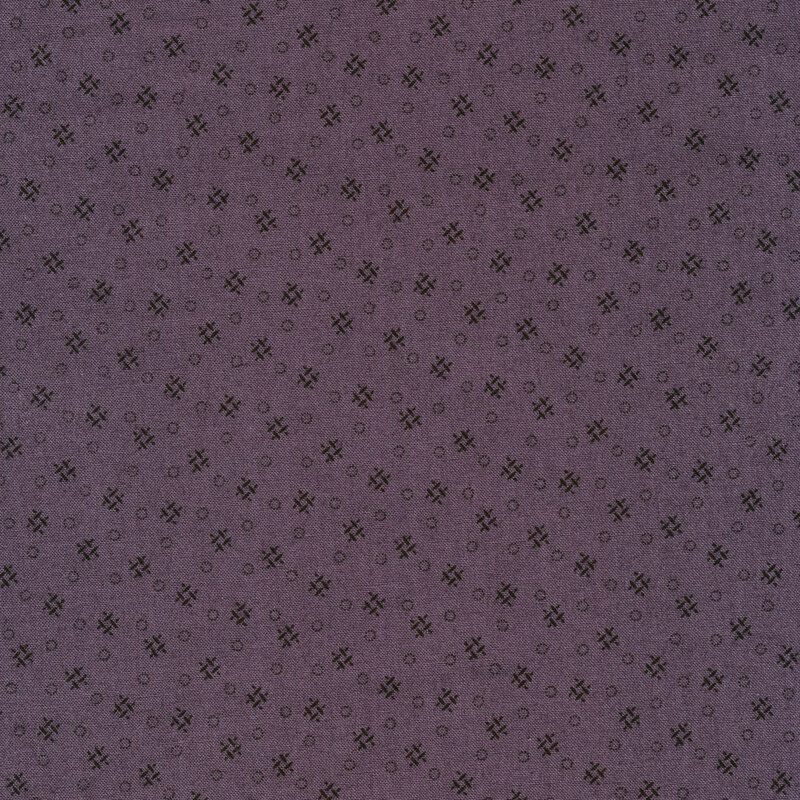 dusty purple fabric features modern geometric patterning that consists of black crosshatches and dotted circles.