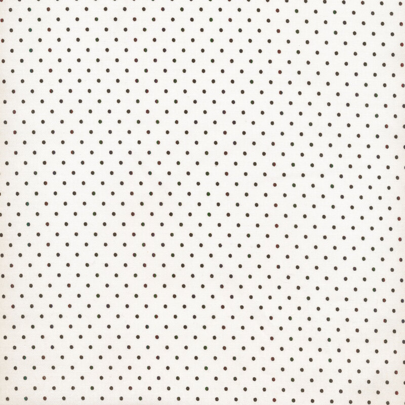 This Moda fabric features an off white background with black polka dots