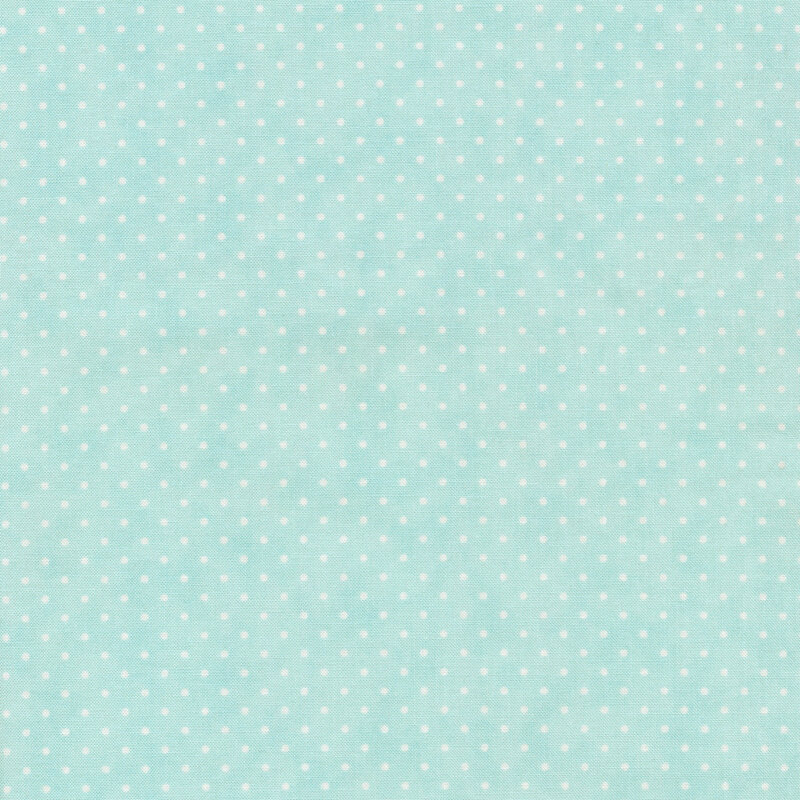 This Moda fabric features a mottled aqua background with off white polka dots