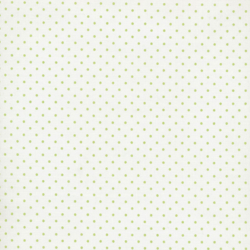 white fabric with light green polka dots