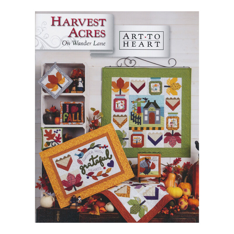 Scan of the front of the Harvest Acres block pattern book, showing the finished quilt and additional finished projects