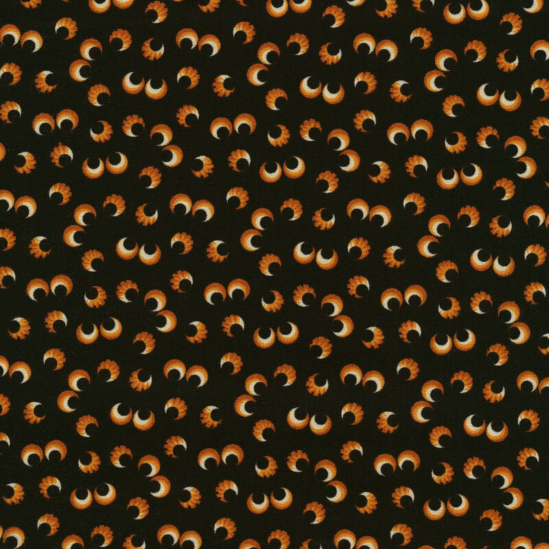 Black fabric with glowing orange pairs of eyes scattered across it