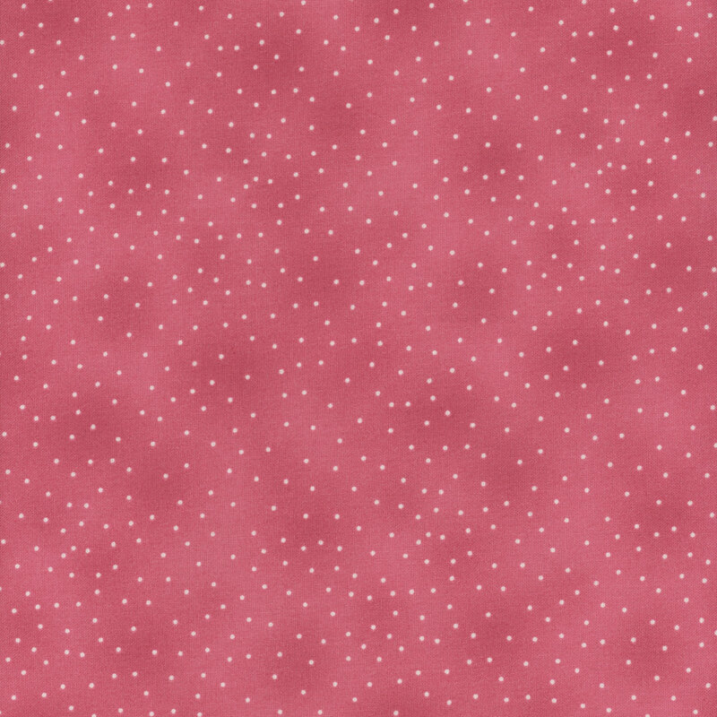 dark mottled pink fabric with white pin dots