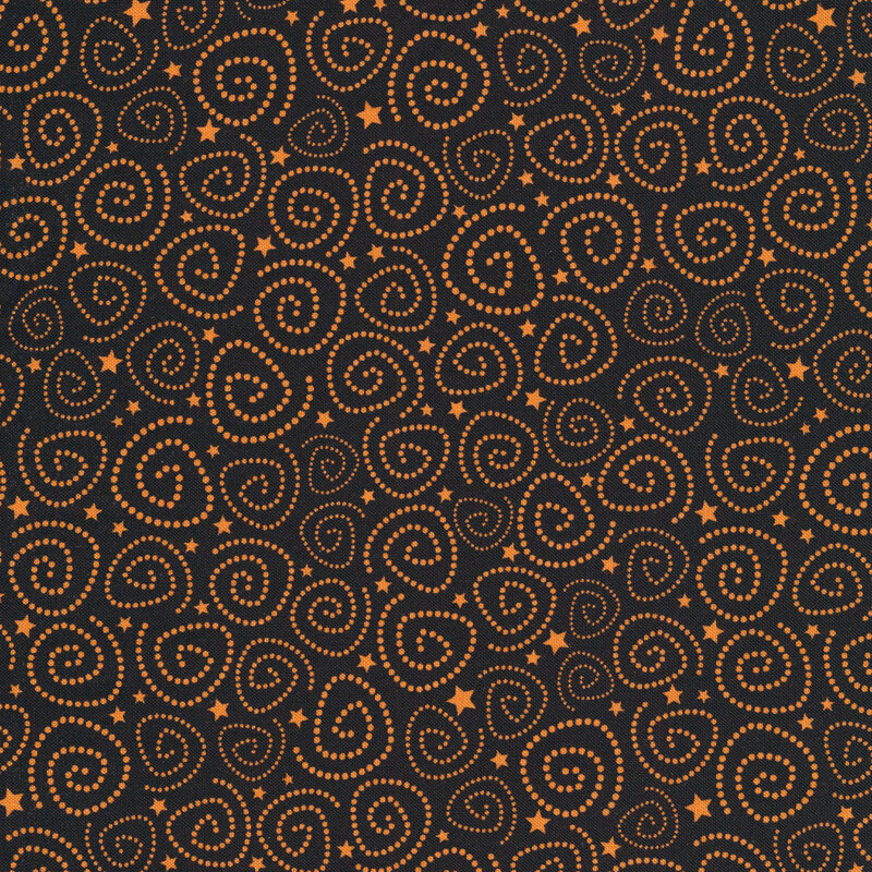 Halloween fabric featuring orange dotted spirals and stars against a solid black background