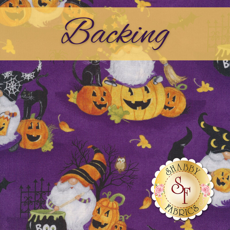 A swatch of purple fabric with scenes of witch gnomes, jack-o-lanterns, black cats, and cauldrons. An orange banner at the top reads 