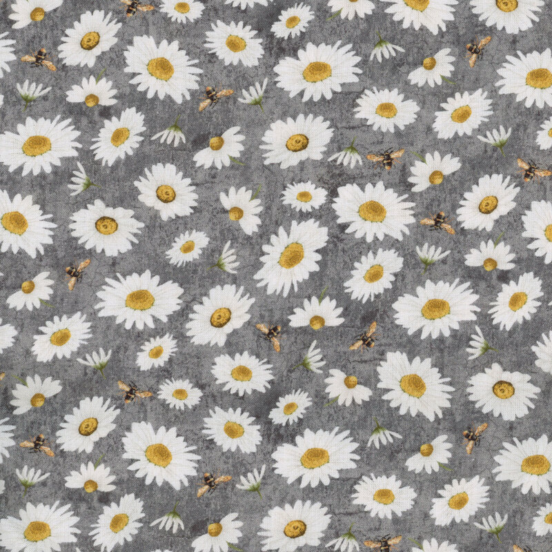 This fabric features tossed daisies and bees on a textured dark grey background.