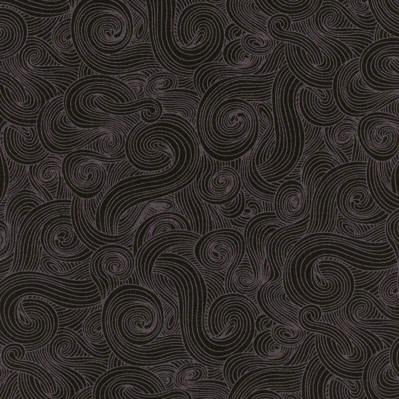 Tonal black and gray fabric with dark swirls on a black background 