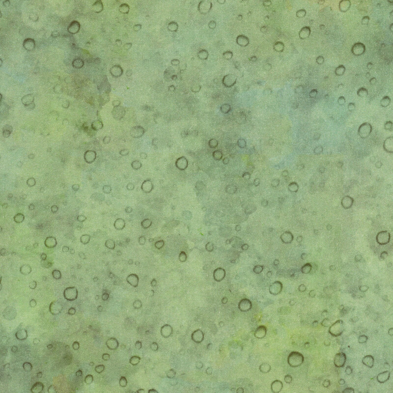 Scan of green textured fabric with water droplet designs scattered across it