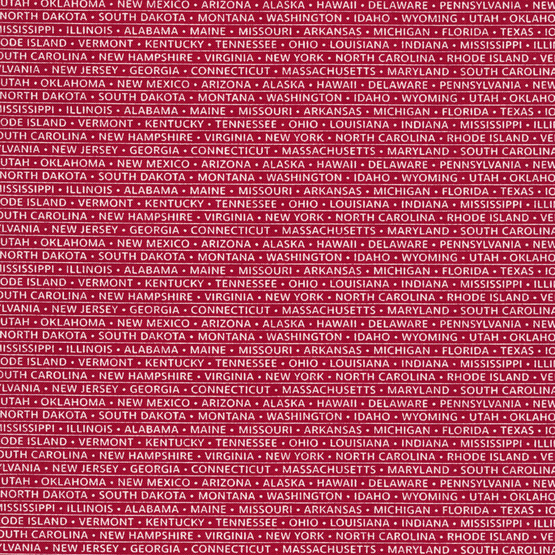 Red fabric with rows of white words listing state names with pinstripes separating rows and dots separating names