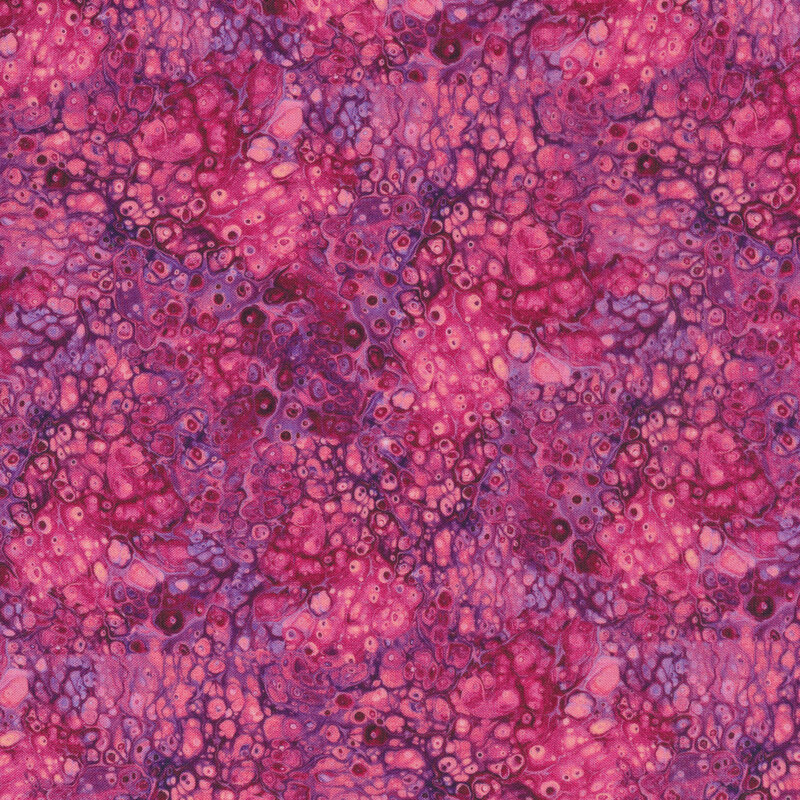 Fabric featuring pink and purple colors with a marbled look resembling pools of liquid