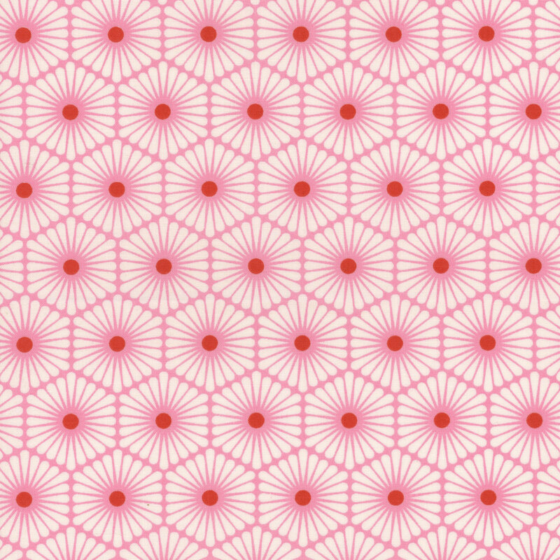 Fabric featuring red circles in the center of light pink connected hexagons on a cream background