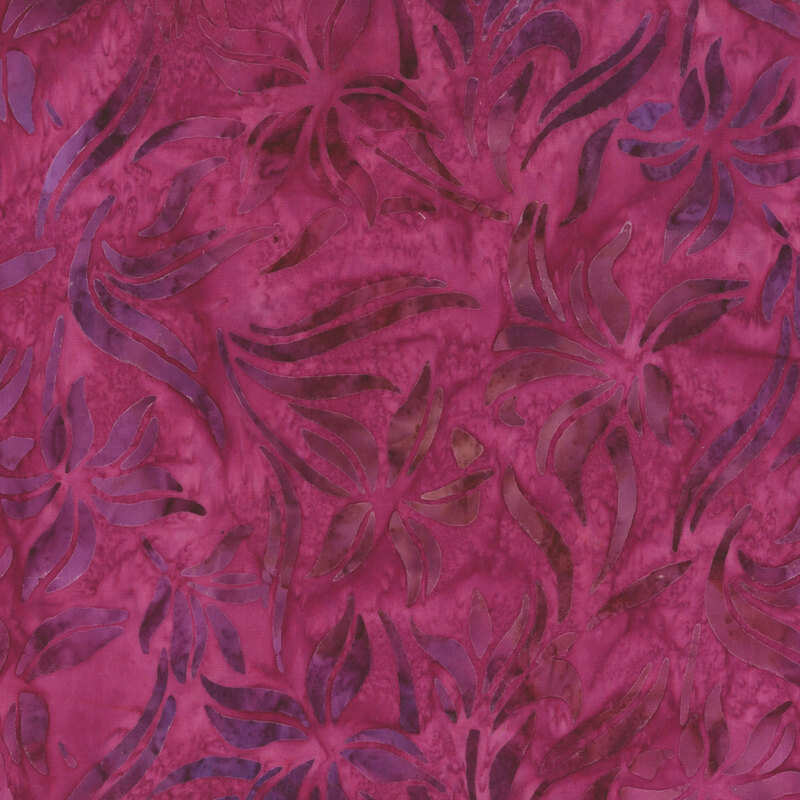 This fabric features abstract flowers and leaves in mottled purple, brown and magenta on a mottled magenta pink background.