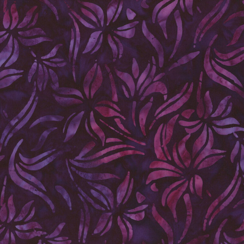 fabric featuring mottled flowers with a dark mottled purple background
