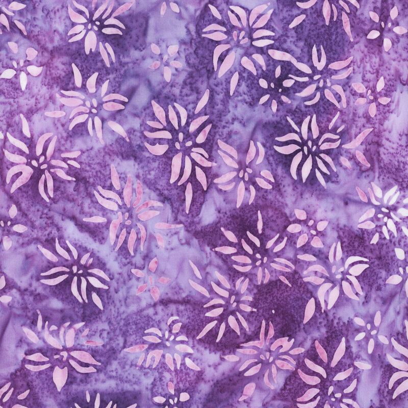 This fabric features light pink mottled flowers with a dark blue purple mottled background.
