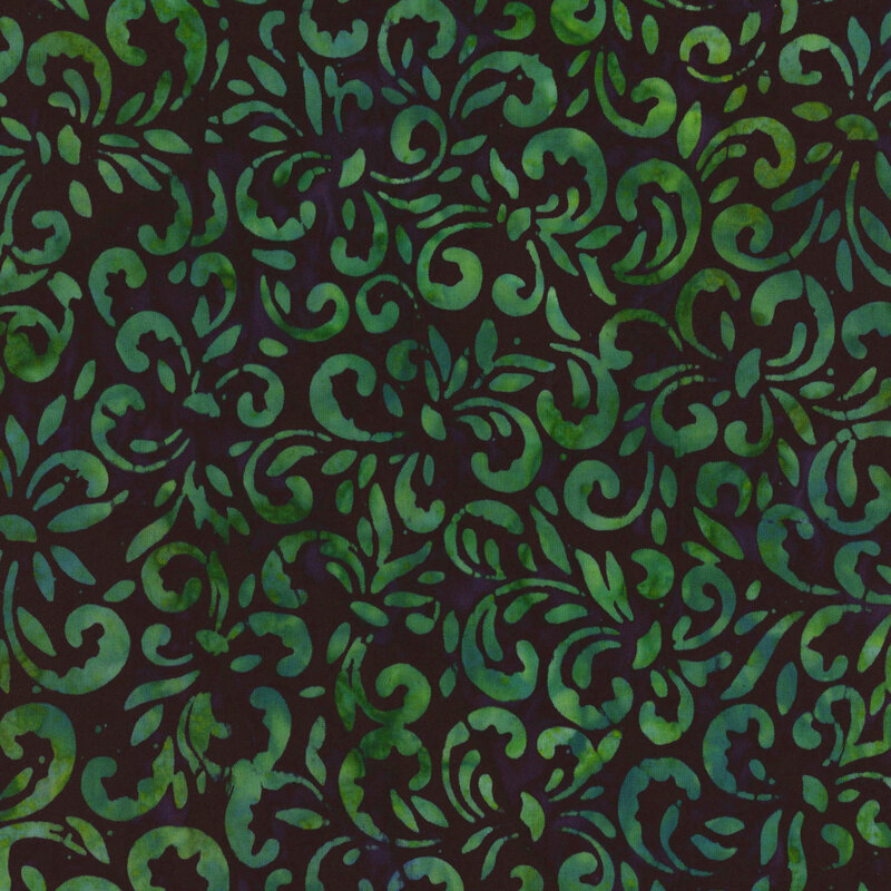 This fabric features a lovely swirl design in mottled green and aqua blue on a dark green background.