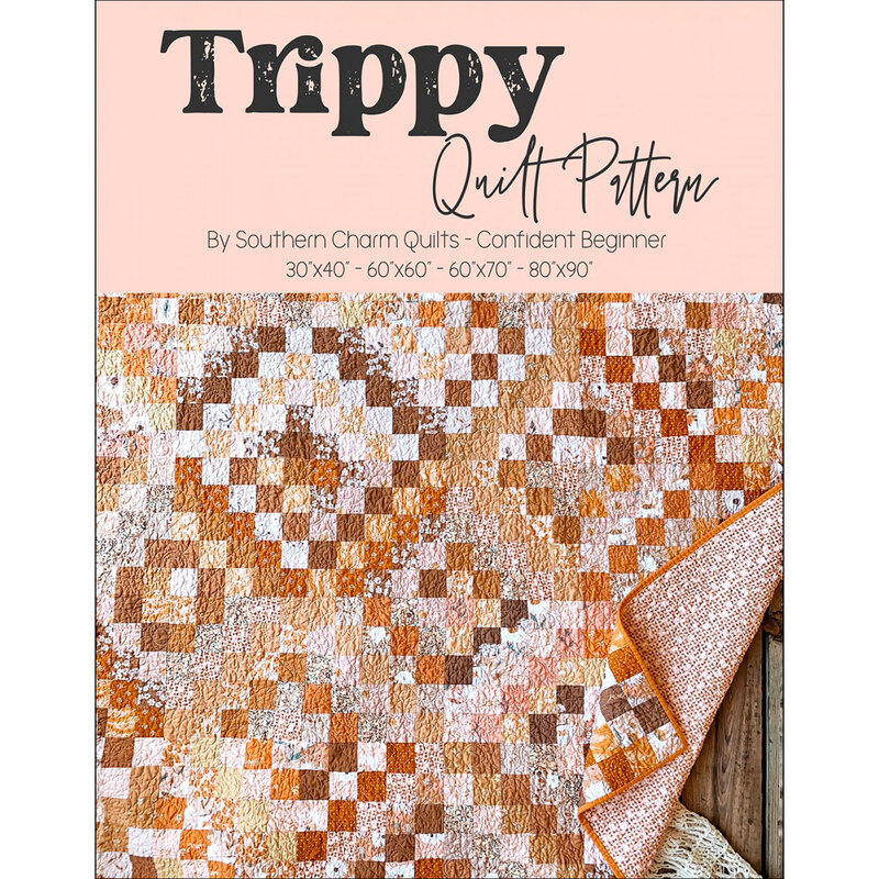 The front of the Trippy Quilt Pattern showing a geometric earthy quilt
