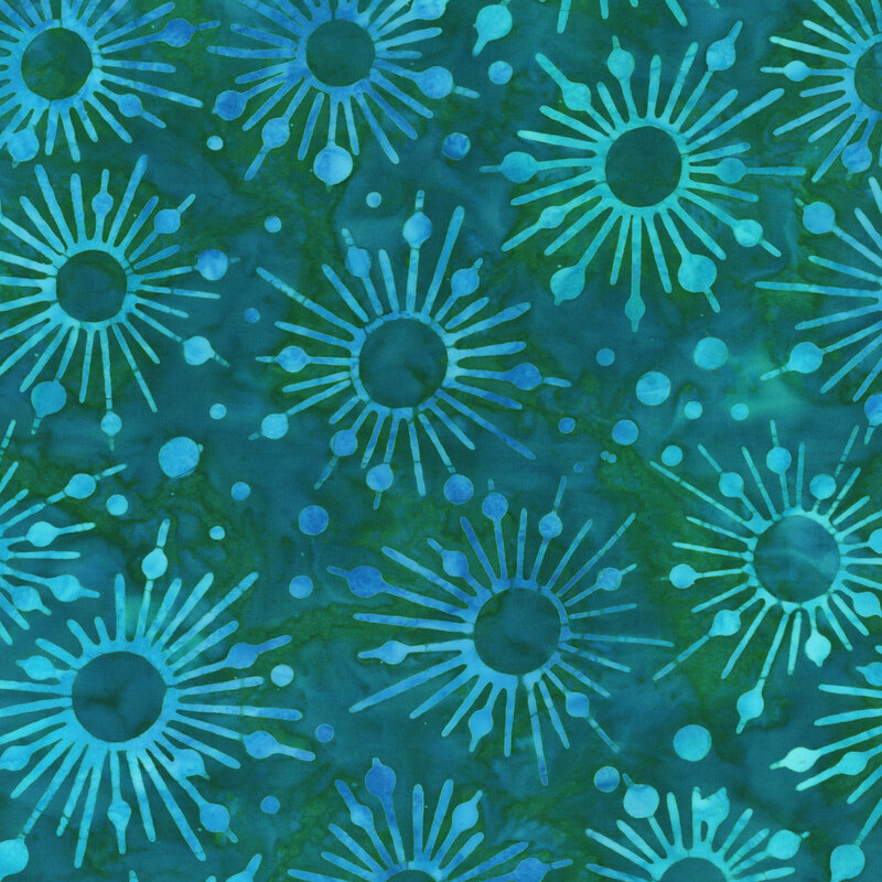 Dark teal mottled batik fabric with light teal and aqua starbursts and dots all over