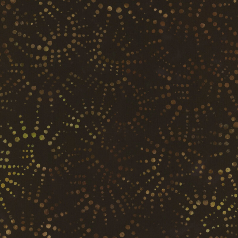 Dark brown mottled fabric with golden yellow half sun dotted bursts