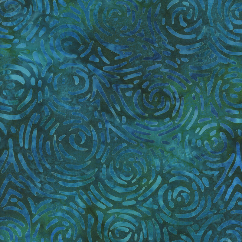 A darker blue-teal mottled batik with royal blue broken swirl patterns all over