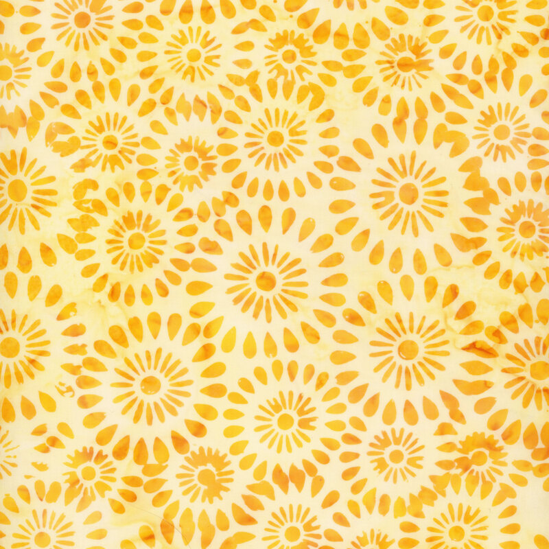 Pale yellow solid fabric with yellow burst patterns scattered all over
