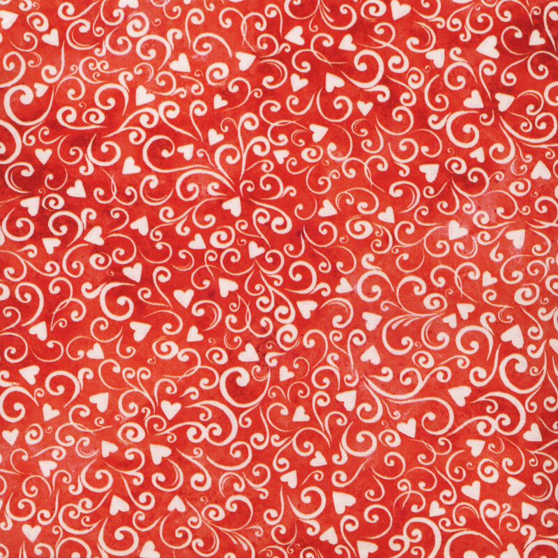 Scan of fabric featuring small white hearts and swirls against a textured red background