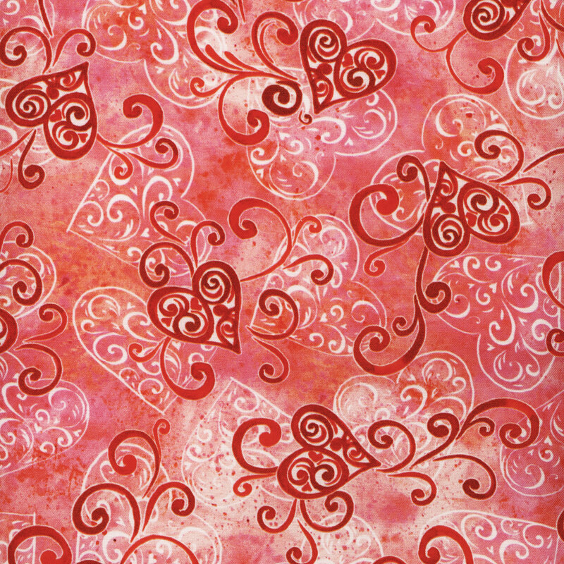 Scan of fabric featuring red and white hearts composed of swirls on a textured pink background