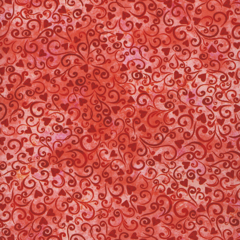 Scan of red fabric featuring tossed tonal hearts and swirls on a textured background