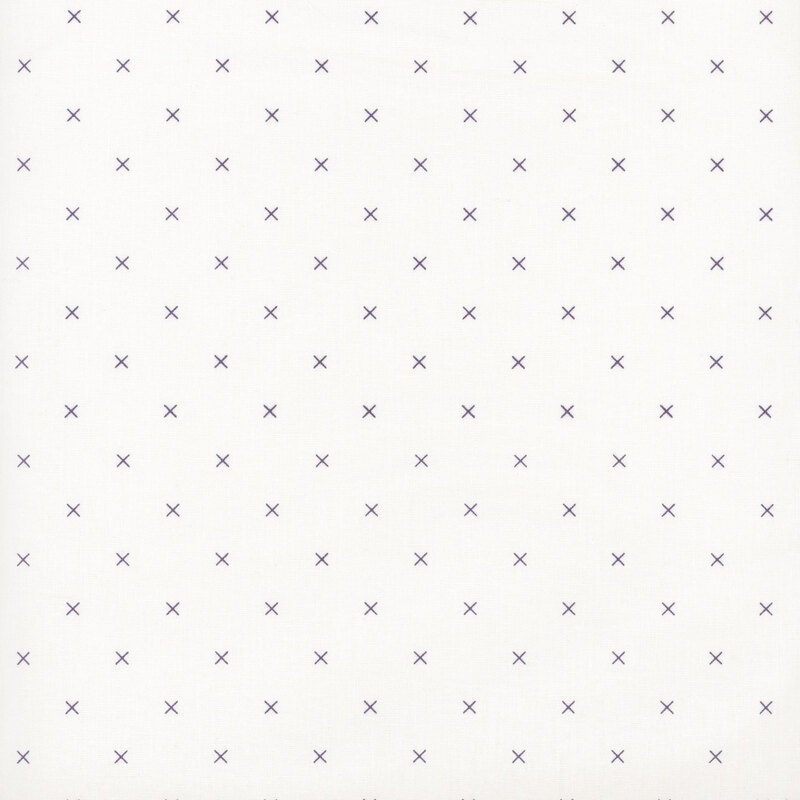 Scan of fabric featuring indigo Xs on a cream background