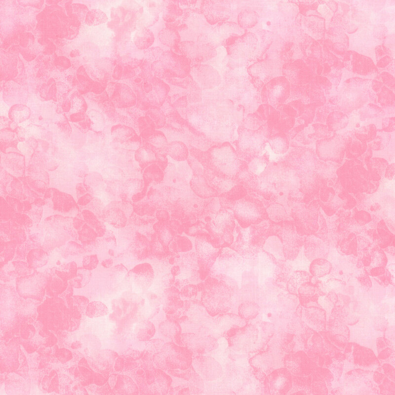fabric with a baby pink color and mottled watercolor markings