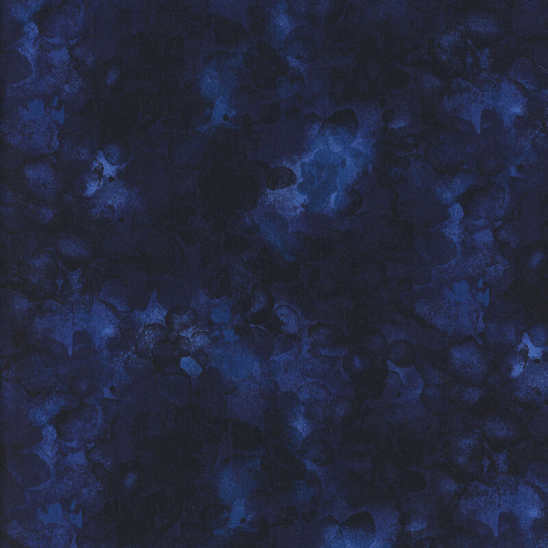 fabric with a deep navy blue color and mottled watercolor markings