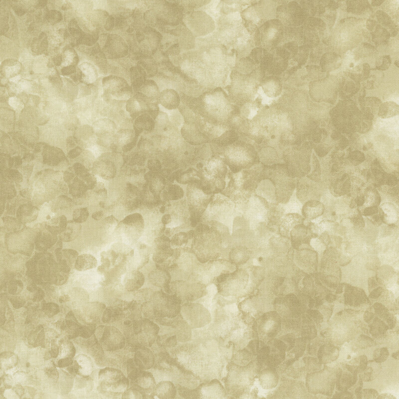 fabric with a dusty tan color and mottled watercolor markings