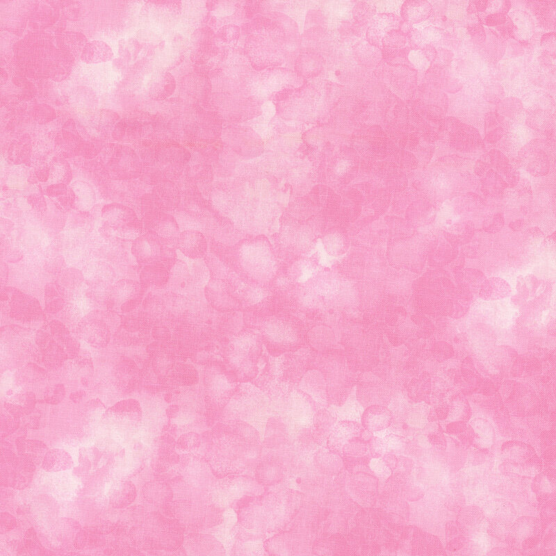 fabric with a light pink color and mottled watercolor markings