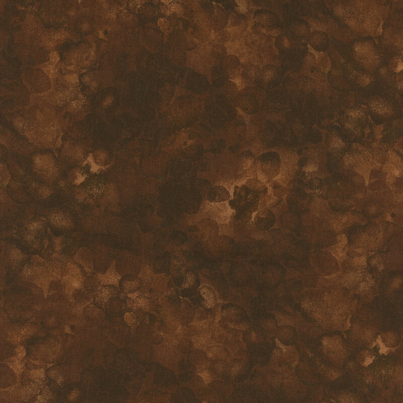 fabric with a warm brown color and mottled watercolor markings