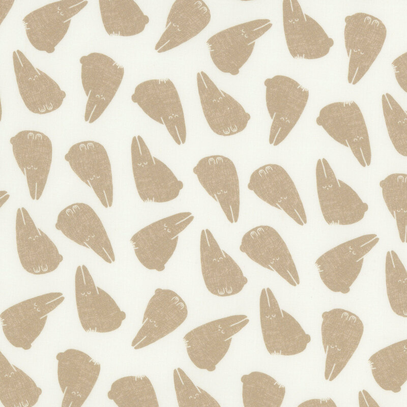 A light pale cream fabric with tossed ditsy bunny rabbits