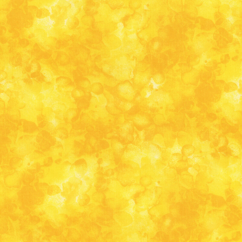 fabric with a bright yellow color and mottled watercolor markings