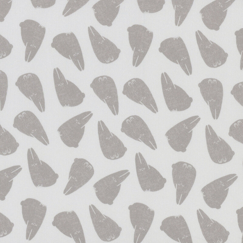 A light pale gray fabric with tossed ditsy bunny rabbits
