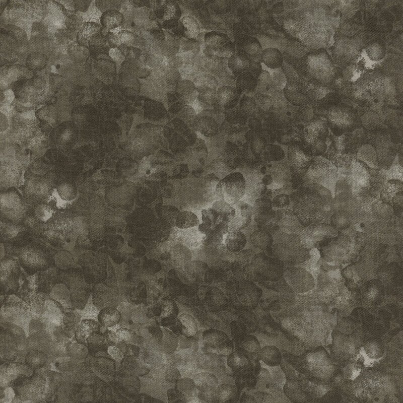 fabric with a speckled grey color and mottled watercolor markings
