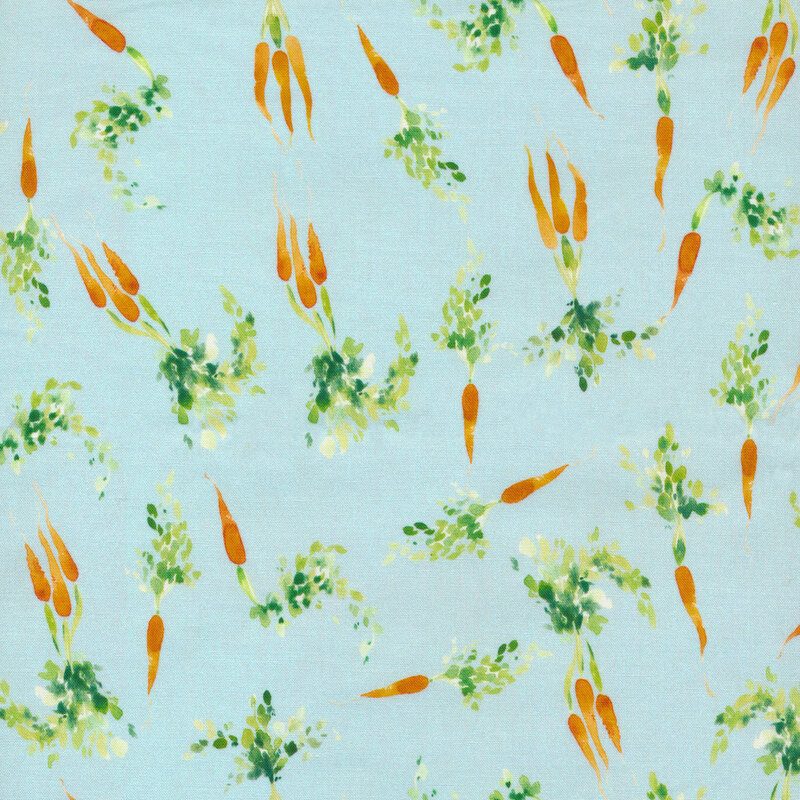 A light aqua fabric covered in bunches of carrots