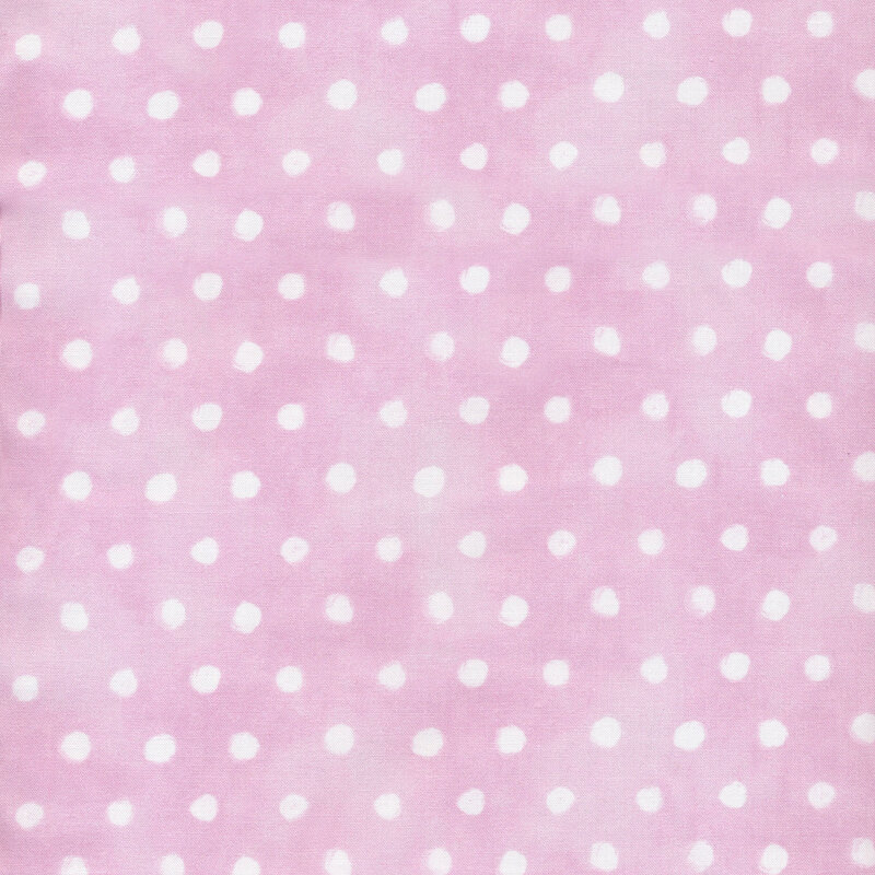 Pink pastel fabric with small white polka dots